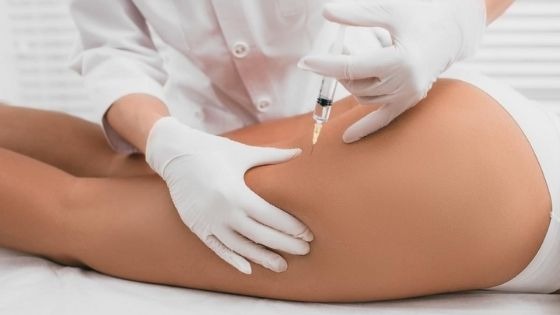 Doctor injecting on cellulite